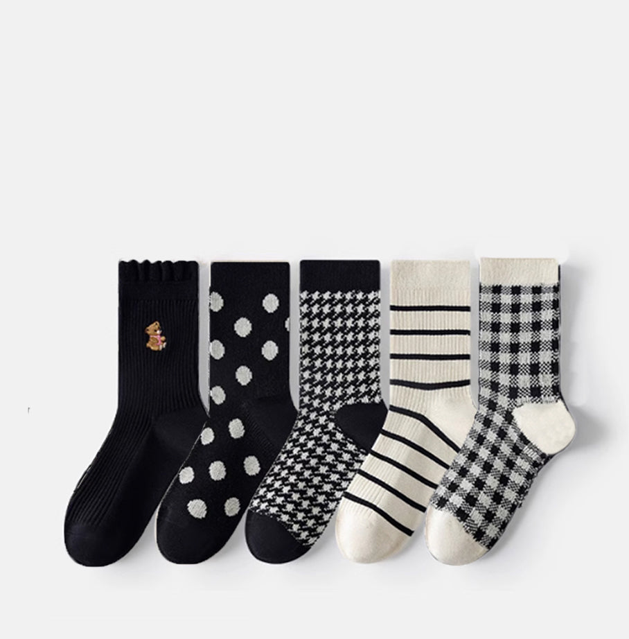 Elevate your wardrobe essentials with the Caramella Sock Black Series 2. 