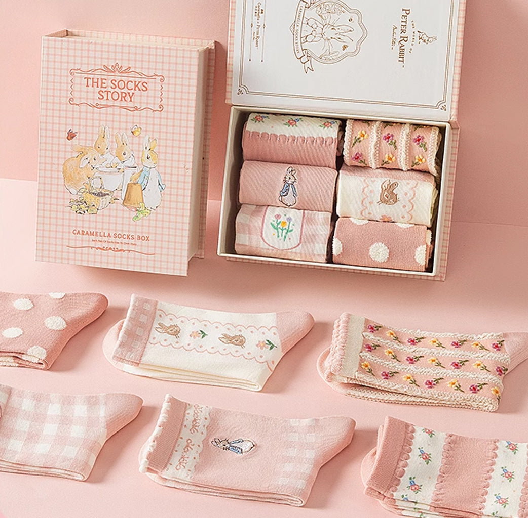 Delight in the charm of Peter Rabbit with this exclusive sock collection by Caramella. Each pair showcases adorable Peter Rabbit designs in a pastel pink theme